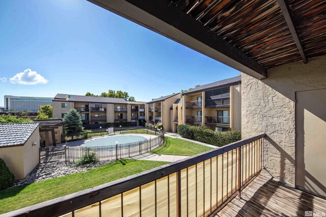 2450 Lymbery St Unit 213, Reno, NV 89509 - balcony featuring view of pool area