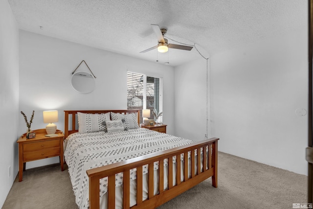 400 S Saliman Rd Unit G56, Carson City, NV 89701 - bedroom featuring carpet, a textured ceiling, and ceiling fan