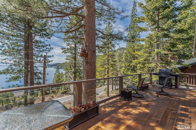 wooden terrace with grilling area