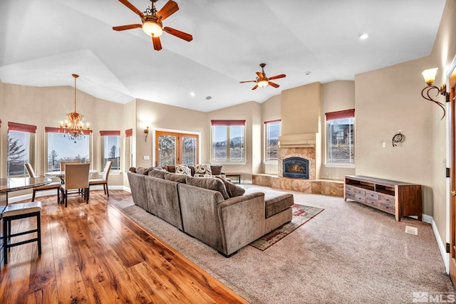 227 S Earlham, Reno, NV 89511 - living room with lofted ceiling, ceiling fan, a chandelier, a tile fireplace, and recessed lighting