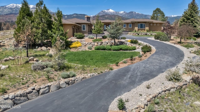 227 S Earlham, Reno, NV 89511 - view of yard featuring curved driveway and a mountain view