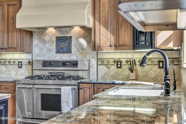 227 S Earlham, Reno, NV 89511 - kitchen featuring double oven range, custom range hood, a sink, backsplash, and brown cabinets