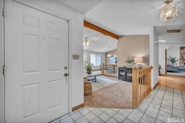 1663 Shadow Wood Ct, Reno, NV 89523 - entryway featuring light colored carpet, baseboards, light tile patterned floors, a textured ceiling, and a ceiling fan