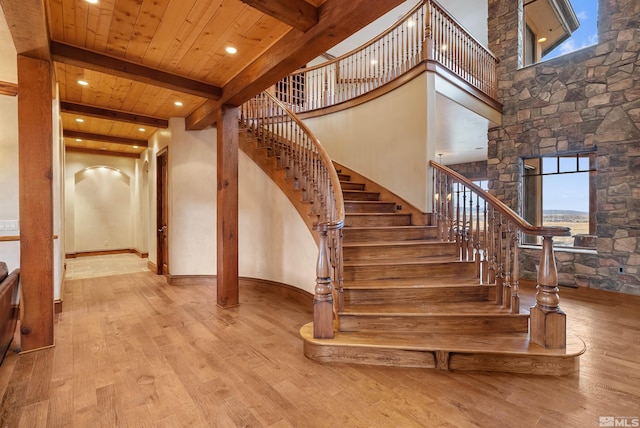 525 Cable Canyon Way, Fernley, NV 89408 - staircase with hardwood / wood-style floors, beamed ceiling, wooden ceiling, and recessed lighting