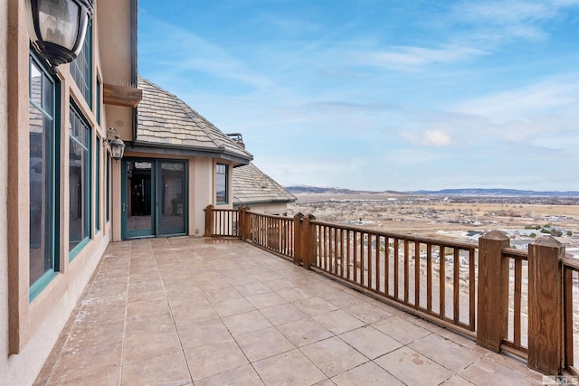 525 Cable Canyon Way, Fernley, NV 89408 - view of patio / terrace with a mountain view and a balcony