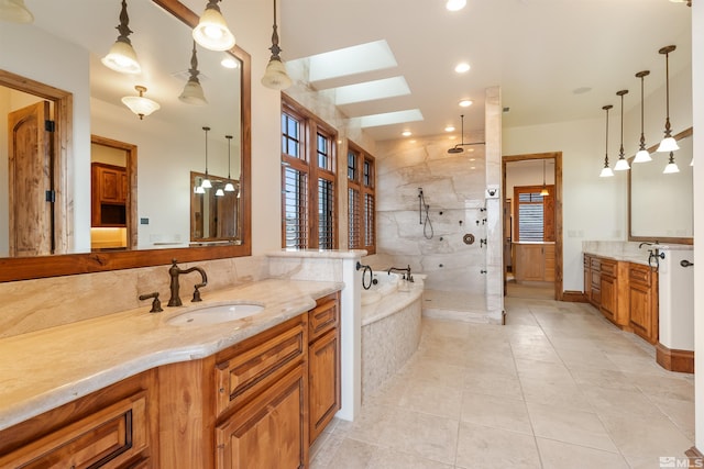 525 Cable Canyon Way, Fernley, NV 89408 - full bathroom with a tile shower, tile patterned flooring, a garden tub, a skylight, and two vanities
