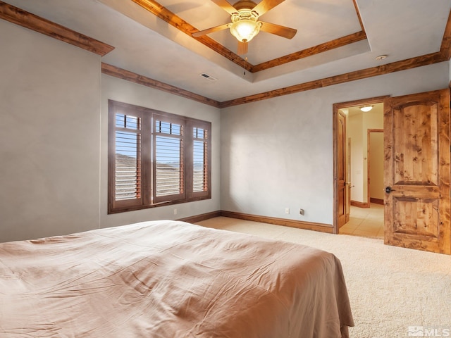 525 Cable Canyon Way, Fernley, NV 89408 - bedroom featuring a raised ceiling, light carpet, baseboards, and a ceiling fan