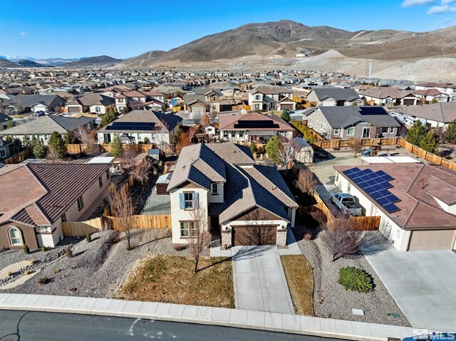 2780 Tobiano Dr, Reno, NV 89521 - aerial perspective of suburban area featuring a mountain backdrop