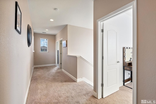 2780 Tobiano Dr, Reno, NV 89521 - corridor featuring light carpet, baseboards, and recessed lighting