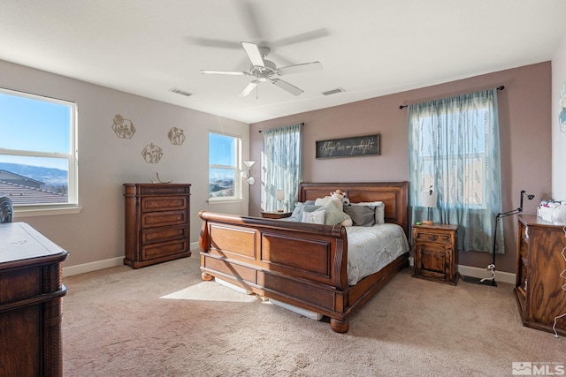 2780 Tobiano Dr, Reno, NV 89521 - bedroom featuring light carpet, baseboards, and ceiling fan