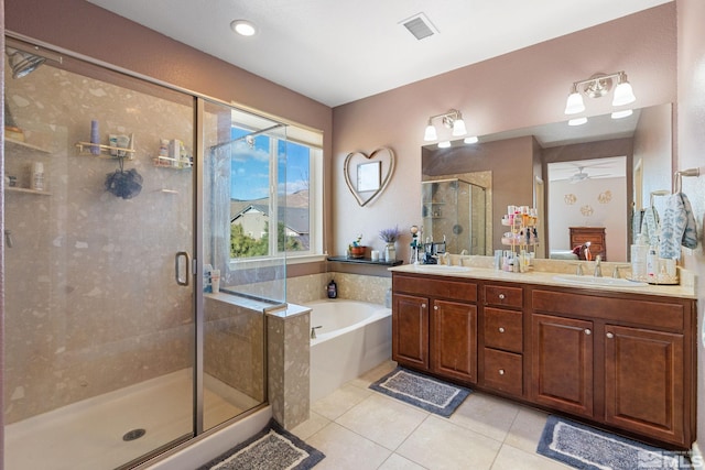 2780 Tobiano Dr, Reno, NV 89521 - full bath featuring tile patterned flooring, a stall shower, a garden tub, ceiling fan, and double vanity
