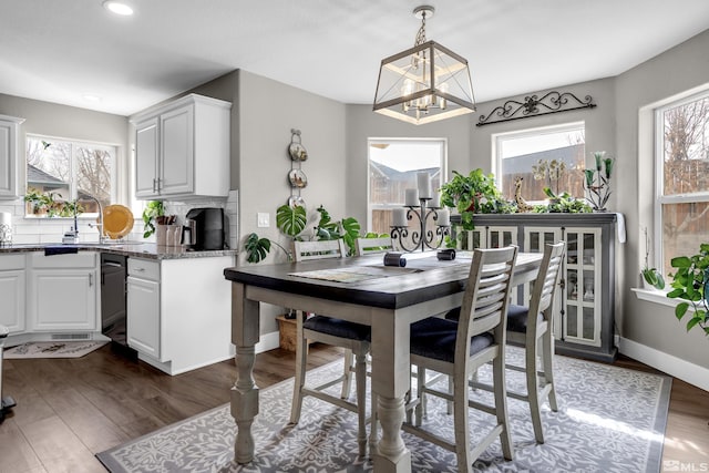953 Julia Ln, Fernley, NV 89408 - dining room featuring a chandelier, dark wood-style floors, recessed lighting, and baseboards