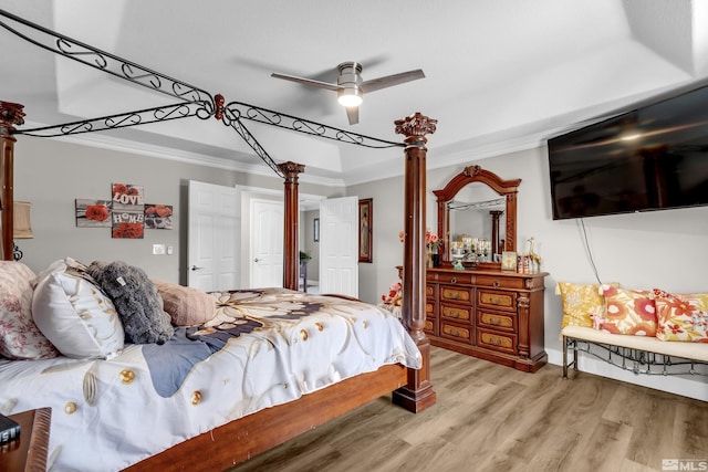 953 Julia Ln, Fernley, NV 89408 - bedroom featuring ornamental molding, decorative columns, light wood-type flooring, and a ceiling fan