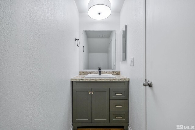 857 Cherry Tree Dr Unit 3, Sparks, NV 89434 - bathroom with a textured wall and vanity