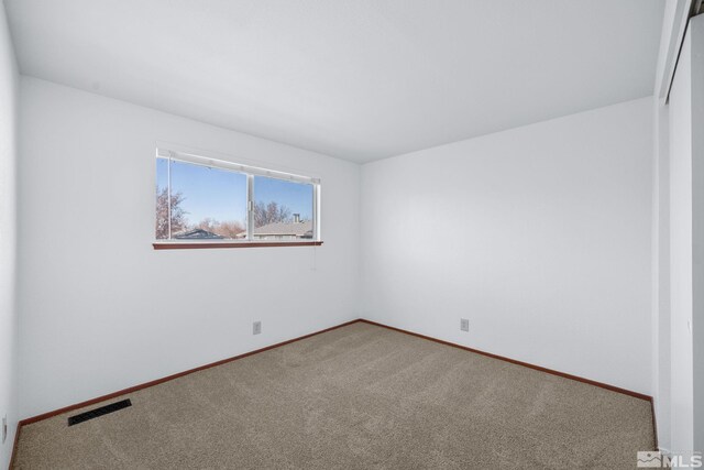 857 Cherry Tree Dr Unit 3, Sparks, NV 89434 - spare room with carpet flooring and baseboards