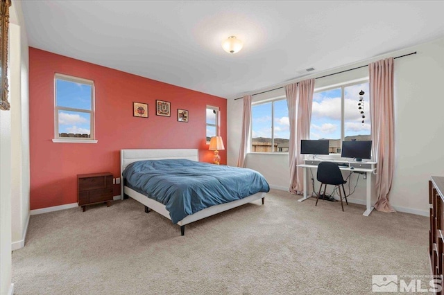 7192 Discovery Ln, Reno, NV 89506 - carpeted bedroom with baseboards and an office area