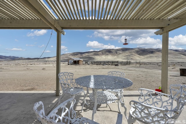 6100 Sage Flat Rd, Reno, NV 89510 - view of patio / terrace featuring a mountain view and fence