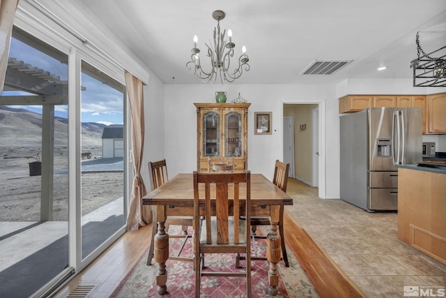 6100 Sage Flat Rd, Reno, NV 89510 - dining area with a chandelier, a mountain view, and recessed lighting