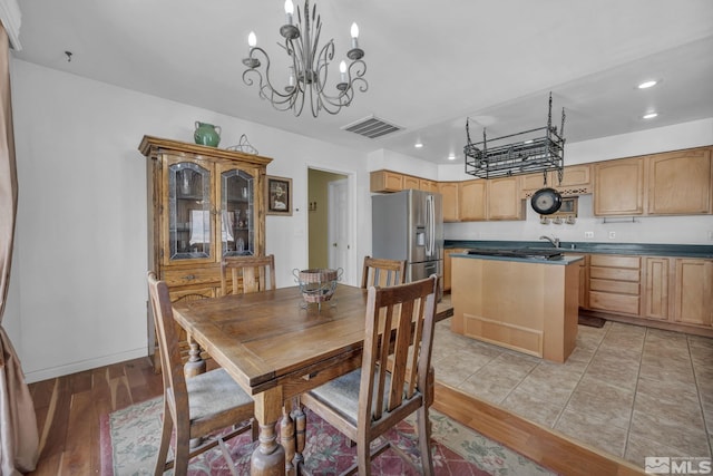 6100 Sage Flat Rd, Reno, NV 89510 - dining space with recessed lighting, a chandelier, light wood-style flooring, and baseboards