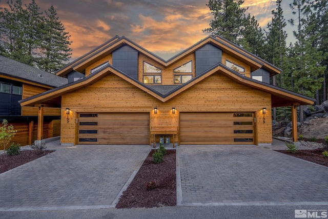 contemporary house with decorative driveway