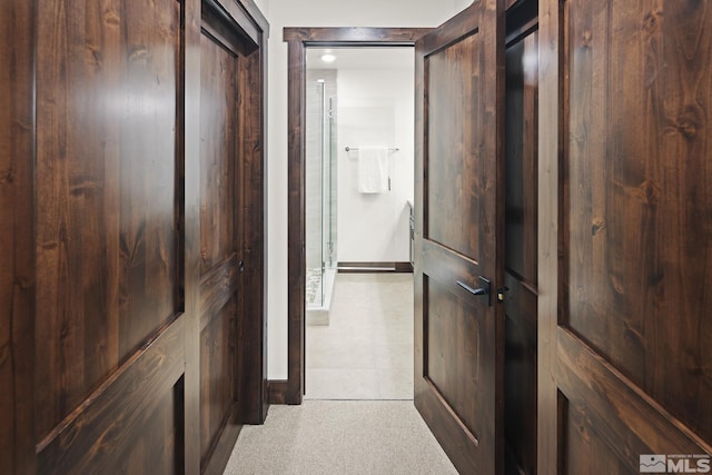 corridor featuring baseboards