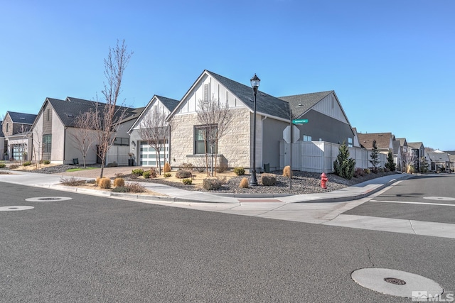 721 Marewood Trl, Reno, NV 89511 - view of front facade with stone siding, a residential view, and fence
