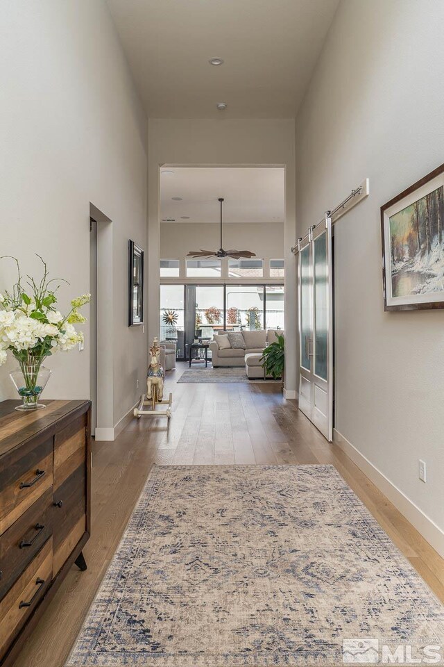 721 Marewood Trl, Reno, NV 89511 - corridor featuring light wood-style floors and baseboards