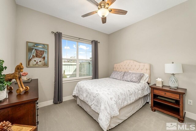 721 Marewood Trl, Reno, NV 89511 - bedroom with light carpet, baseboards, and ceiling fan