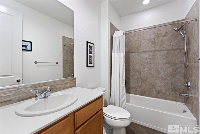 9820 Hafflinger Ln, Reno, NV 89521 - bathroom featuring shower / tub combo, vanity, and toilet