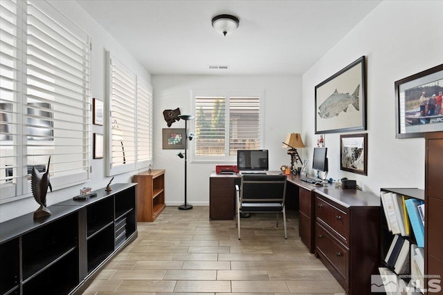 9820 Hafflinger Ln, Reno, NV 89521 - office area featuring light wood-type flooring and baseboards