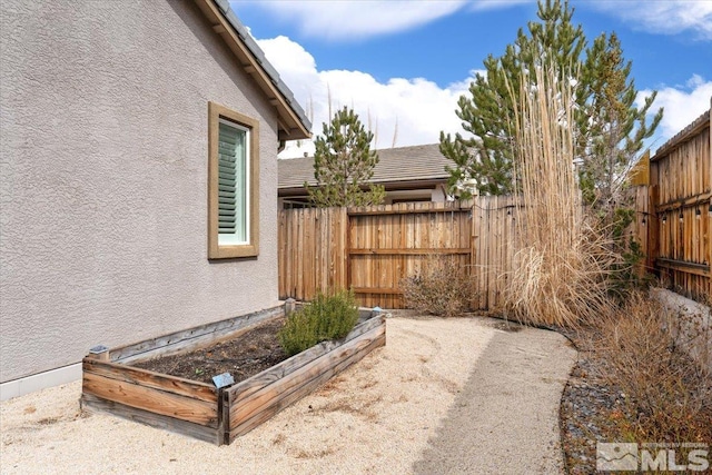 9820 Hafflinger Ln, Reno, NV 89521 - view of yard featuring a vegetable garden