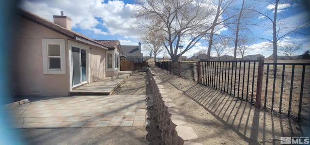 933 Julia Ln, Fernley, NV 89408 - view of patio with a fenced backyard