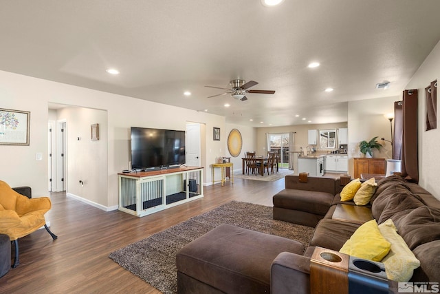 1953 Verona Dr, Fallon, NV 89406 - living area with a ceiling fan, dark wood finished floors, recessed lighting, and baseboards