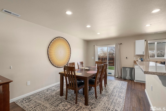 1953 Verona Dr, Fallon, NV 89406 - dining room with recessed lighting, dark wood-style flooring, baseboards, and a textured ceiling