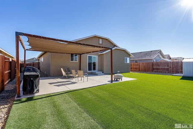 1953 Verona Dr, Fallon, NV 89406 - rear view of house with stucco siding and a patio area
