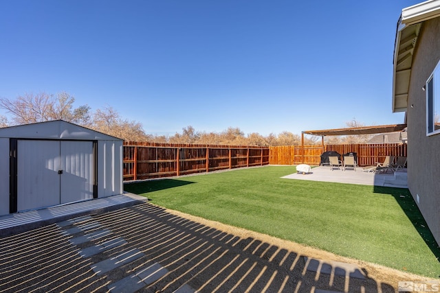 1953 Verona Dr, Fallon, NV 89406 - view of yard featuring a storage shed, a patio, and an outdoor structure