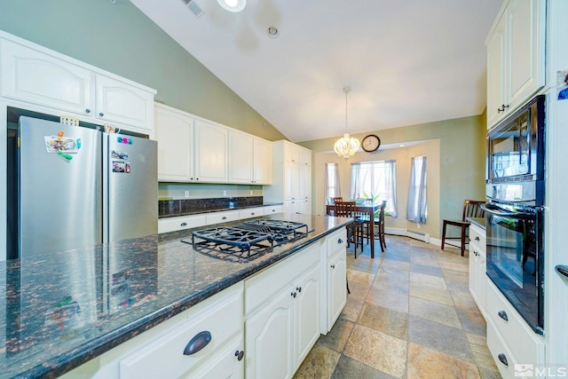 1253 Briggs Ln, Fallon, NV 89406 - kitchen featuring black appliances, white cabinets, lofted ceiling, pendant lighting, and a chandelier