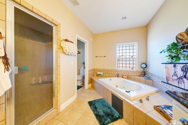 1253 Briggs Ln, Fallon, NV 89406 - bathroom with a stall shower, toilet, a tub with jets, and tile patterned floors