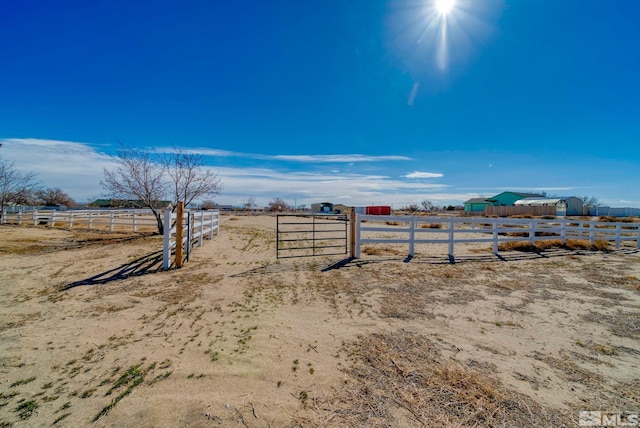 1253 Briggs Ln, Fallon, NV 89406 - view of yard featuring a rural view and fence