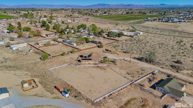 1253 Briggs Ln, Fallon, NV 89406 - aerial view of property and surrounding area featuring a mountain backdrop, a desert landscape, and rural landscape