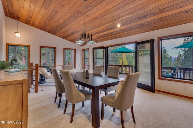 572 Rockrose Ct, Incline Village, NV 89451 - dining area with light colored carpet, lofted ceiling, baseboards, plenty of natural light, and wood ceiling