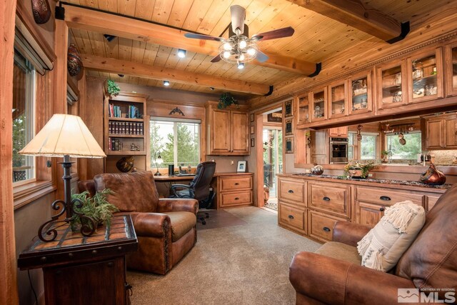 1101 Sierra Country Ct, Gardnerville, NV 89460 - home office featuring wooden ceiling, a ceiling fan, beamed ceiling, and light carpet