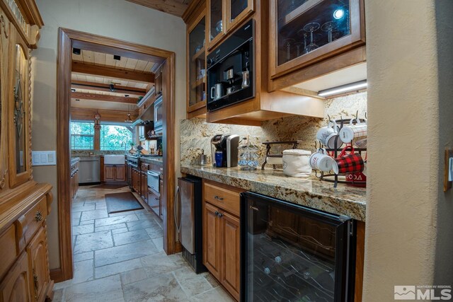 1101 Sierra Country Ct, Gardnerville, NV 89460 - indoor bar with wine cooler, stone tile flooring, stainless steel appliances, tasteful backsplash, and beam ceiling