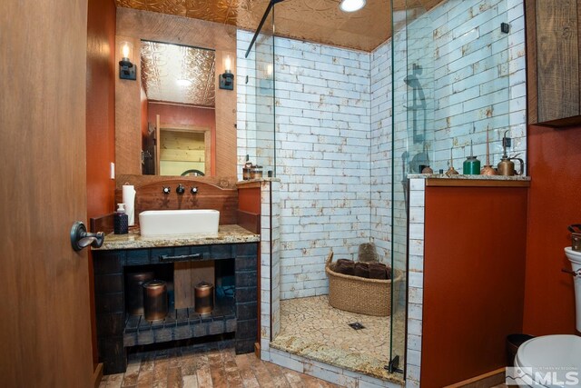 1101 Sierra Country Ct, Gardnerville, NV 89460 - bathroom with toilet, a stall shower, and vanity