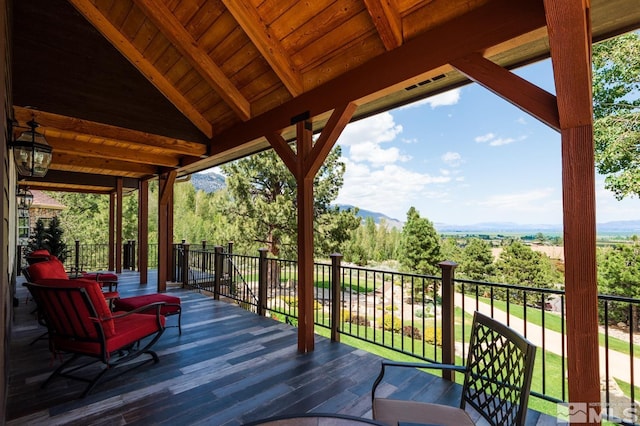 1101 Sierra Country Ct, Gardnerville, NV 89460 - wooden deck featuring a mountain view