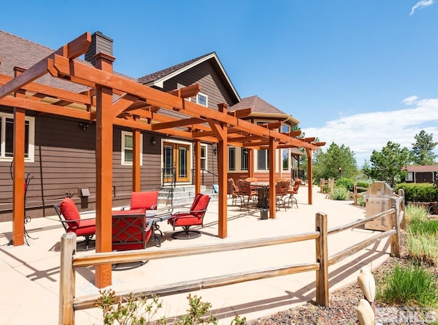1101 Sierra Country Ct, Gardnerville, NV 89460 - rear view of house with a pergola, a patio, a chimney, a shingled roof, and outdoor dining space