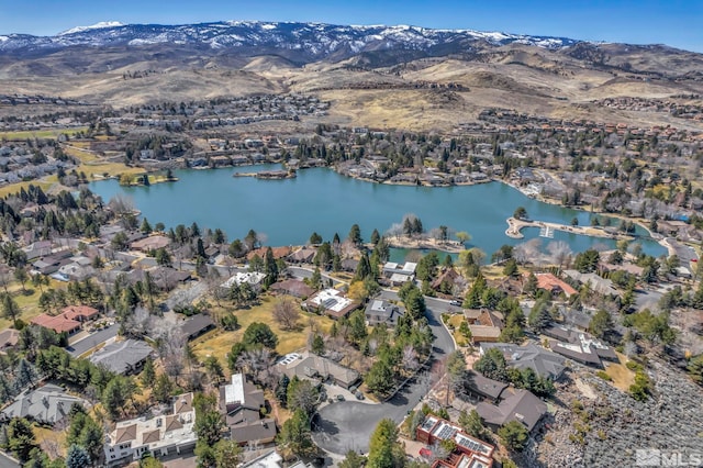 2570 Spinnaker Dr, Reno, NV 89519 - aerial overview of property's location with a water and mountain view and nearby suburban area
