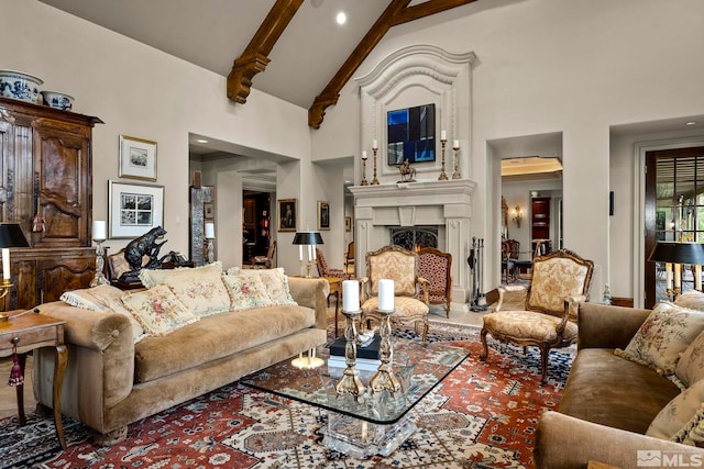 6025 Lake Geneva, Reno, NV 89511 - living room featuring high vaulted ceiling, beamed ceiling, a lit fireplace, and recessed lighting