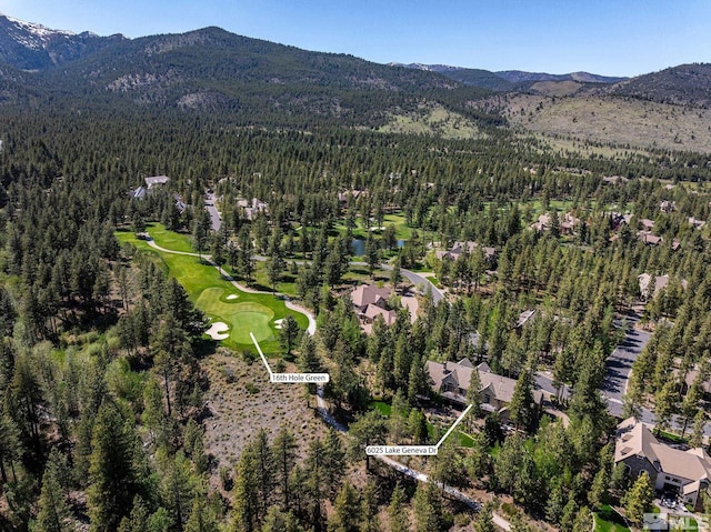 6025 Lake Geneva, Reno, NV 89511 - aerial overview of property's location with a heavily wooded area, mountains, and a golf club