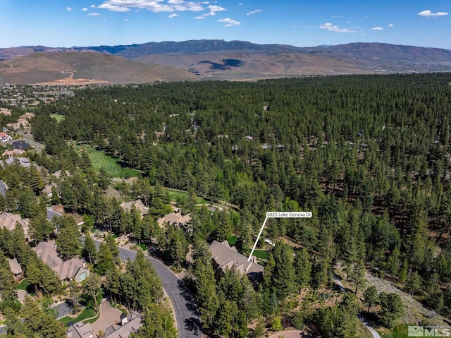 6025 Lake Geneva, Reno, NV 89511 - aerial view of property's location featuring a forest and mountains